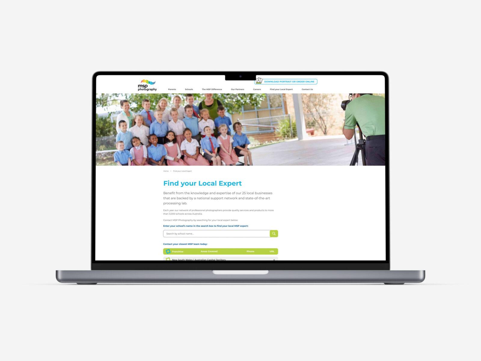 A laptop screen displaying a page from MSP Photography website.