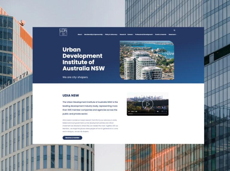 A desktop screenshot with the home page design for the UDIA NSW website.