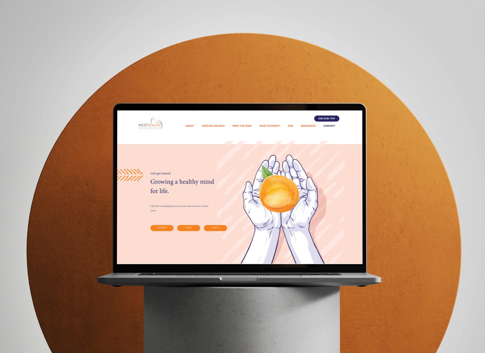 A laptop mockup with the screen displaying the home page design for Westhealth Psychology website.